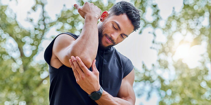 patient needing elbow pain chiropractor in Austin