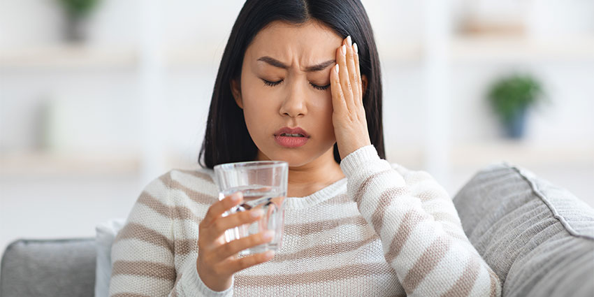 patient needing headache chiropractor in Austin
