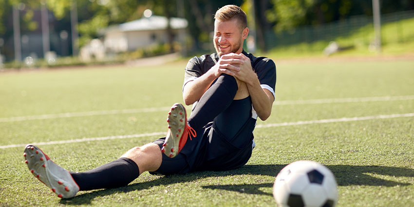 patient needing knee pain chiropractor in Austin