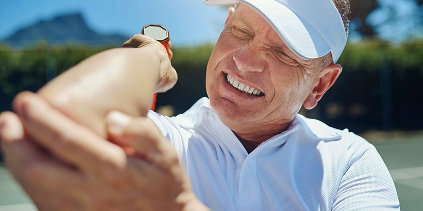 patient needing tennis elbow chiropractor in Austin