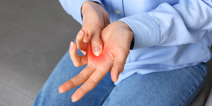 patient needing trigger finger chiropractor in Austin