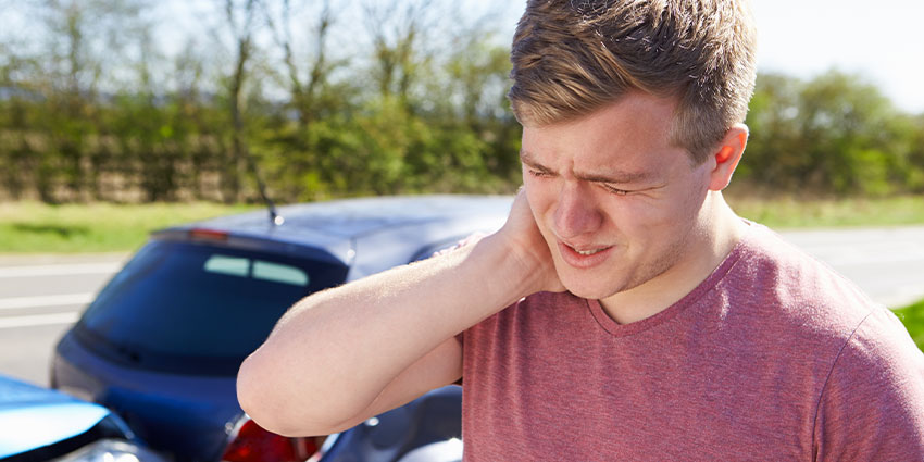 patient needing whiplash chiropractor in Austin