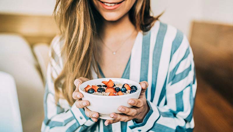 patient eating healthier after receiving advice from a Austin Chiropractor at True Chiropractic