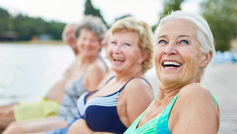senior women enjoying life after a chiropractic adjustment from a Austin Chiropractor at True Chiropractic